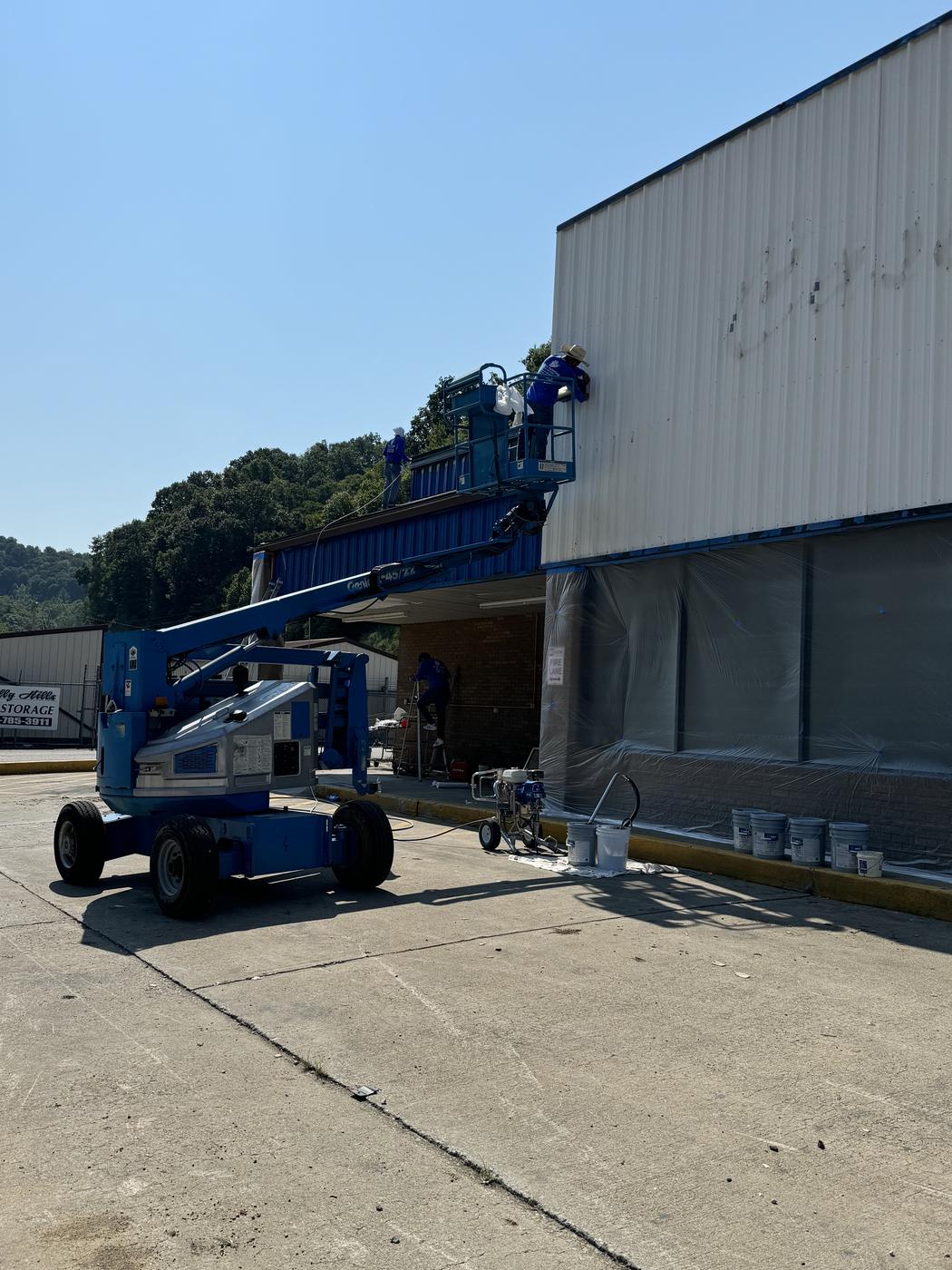 Lift equipment staged at a commercial job site