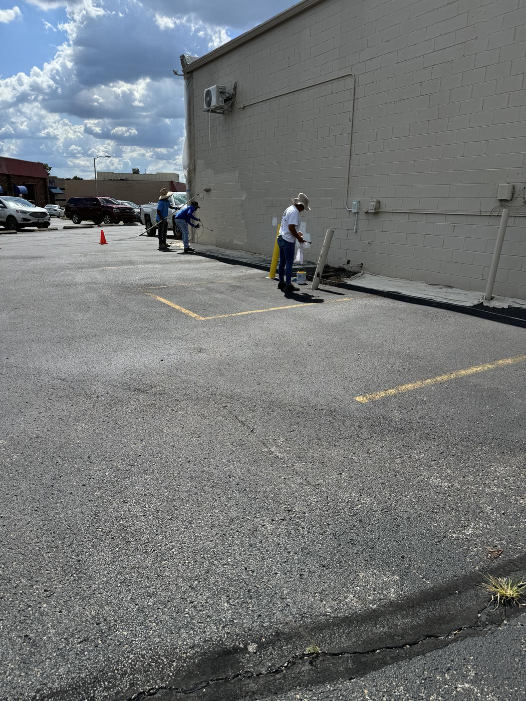 Javier Painting crew on site at a commercial building