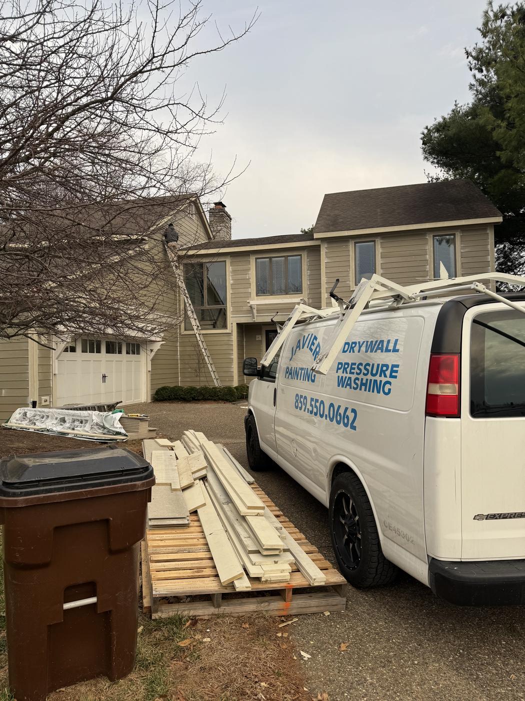Company van loaded with materials at a job site